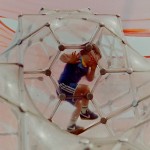 child climbing in a bubble